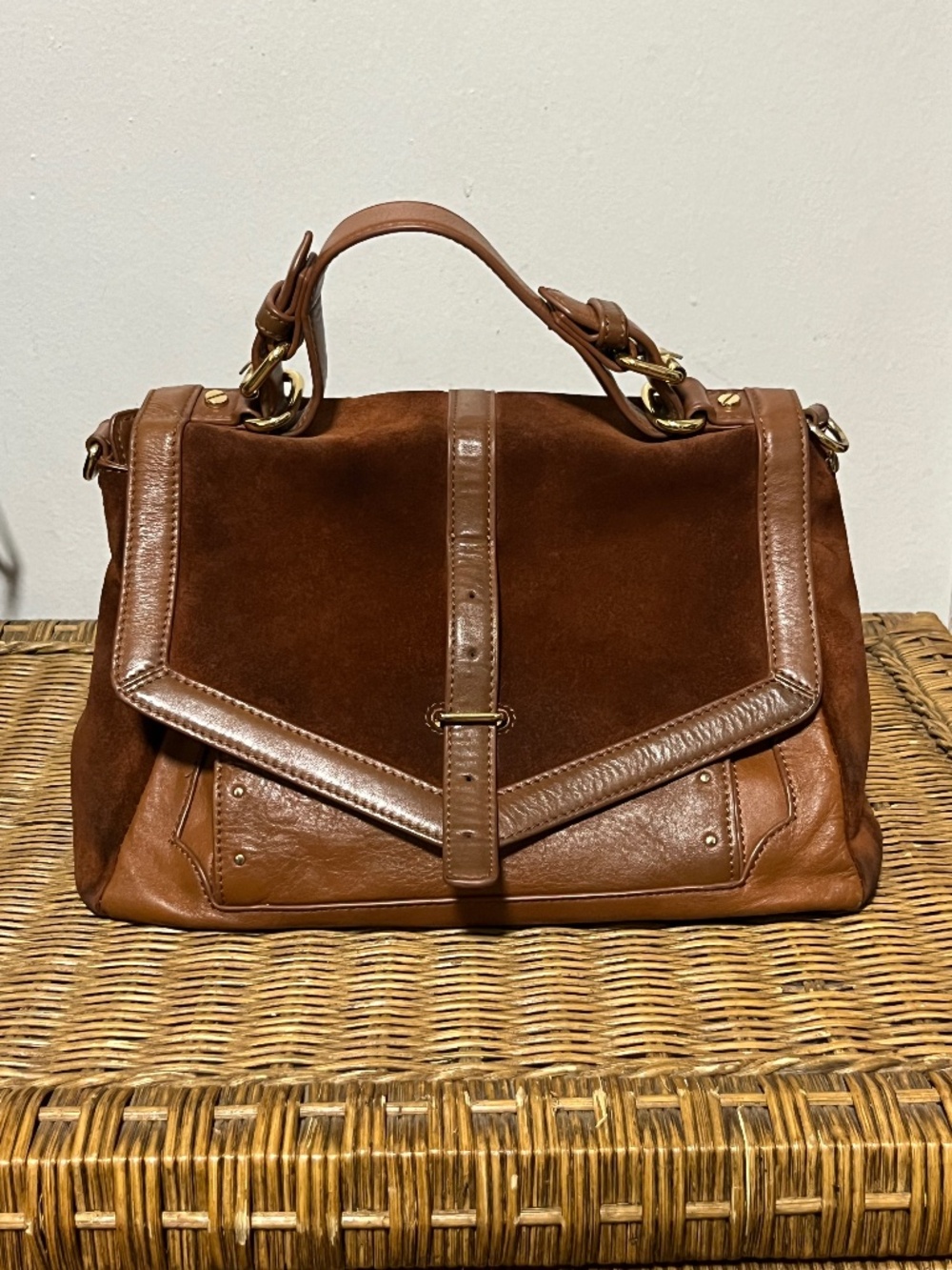 Tory Burch 797 suede and leather messenger bag.